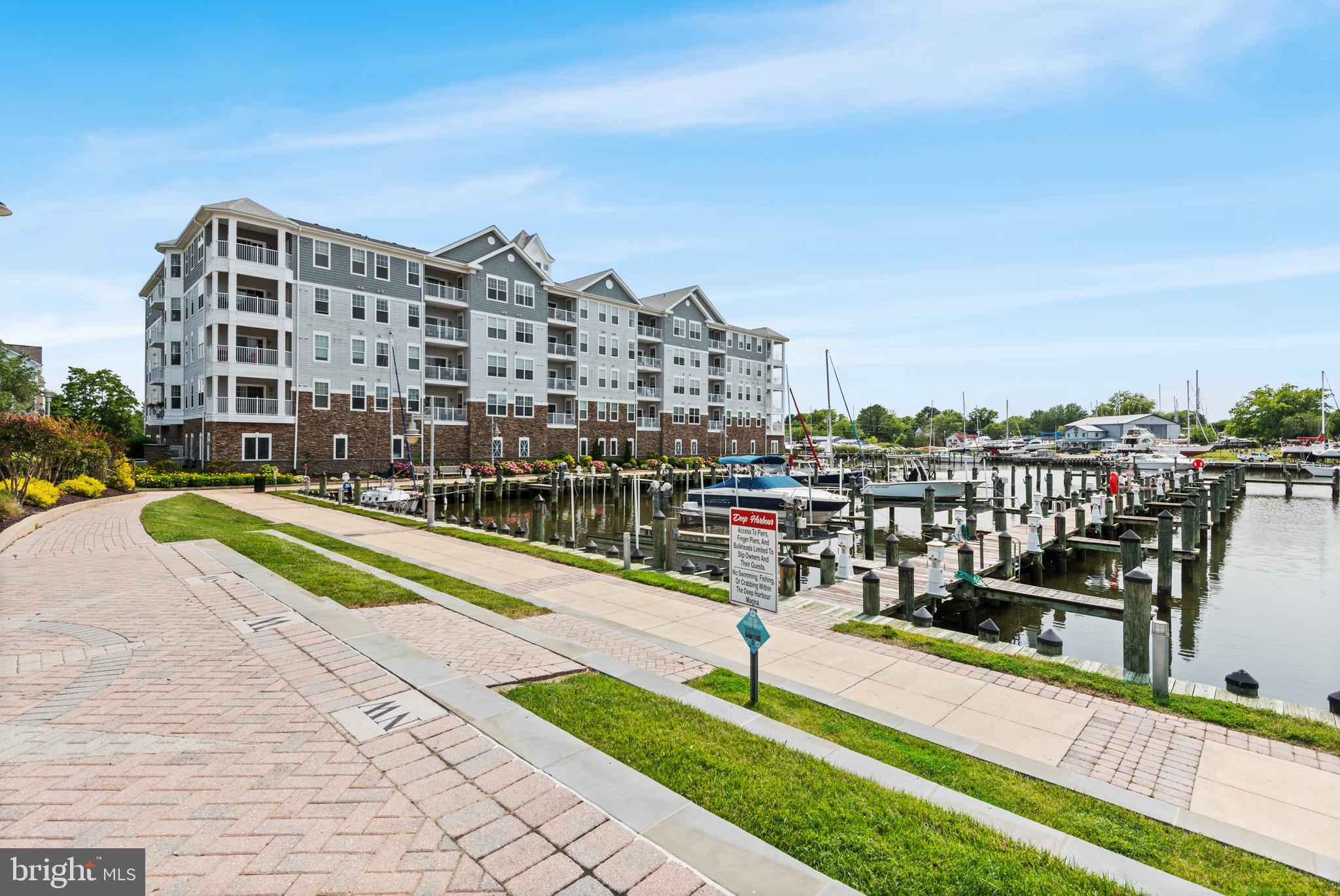 900 Marshy Cove, Unit 103 Cambridge, MD 21613 - Photo 17 of 19 a view of a city with tall buildings