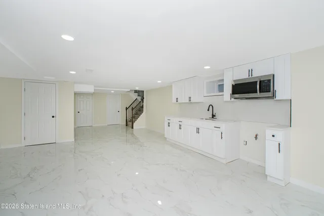 $879,000 | 43 Country Woods Lane | Great Kills