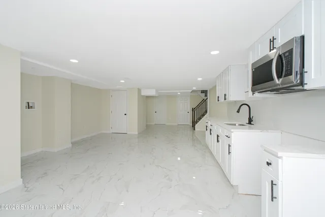 $879,000 | 43 Country Woods Lane | Great Kills