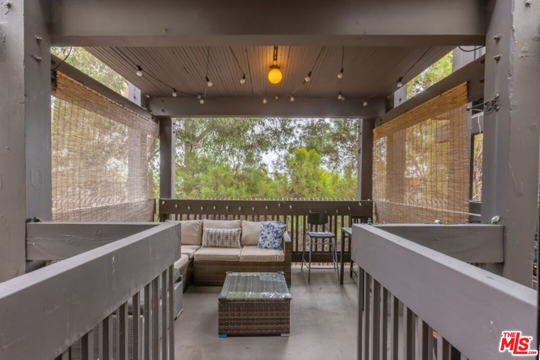 a bathroom with a large tub and sink