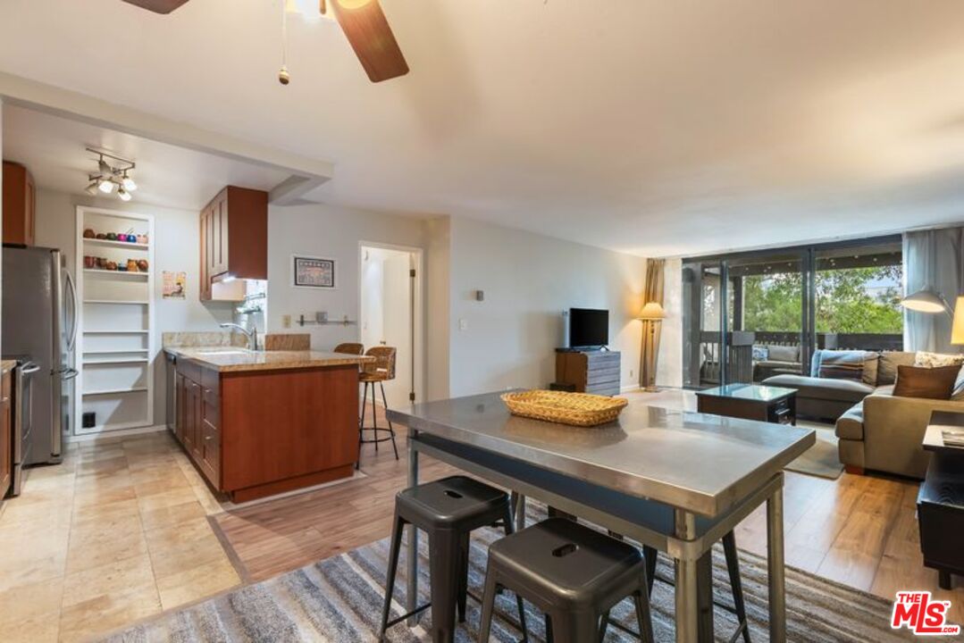 7765 West 91st Street, Unit A2117 Playa del Rey, CA 90293 - Photo 3 of 27 a view of a dining room with furniture