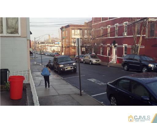 717 16th Street Union City, NJ 07087 - Photo 4 of 8 a black and white photo of a building