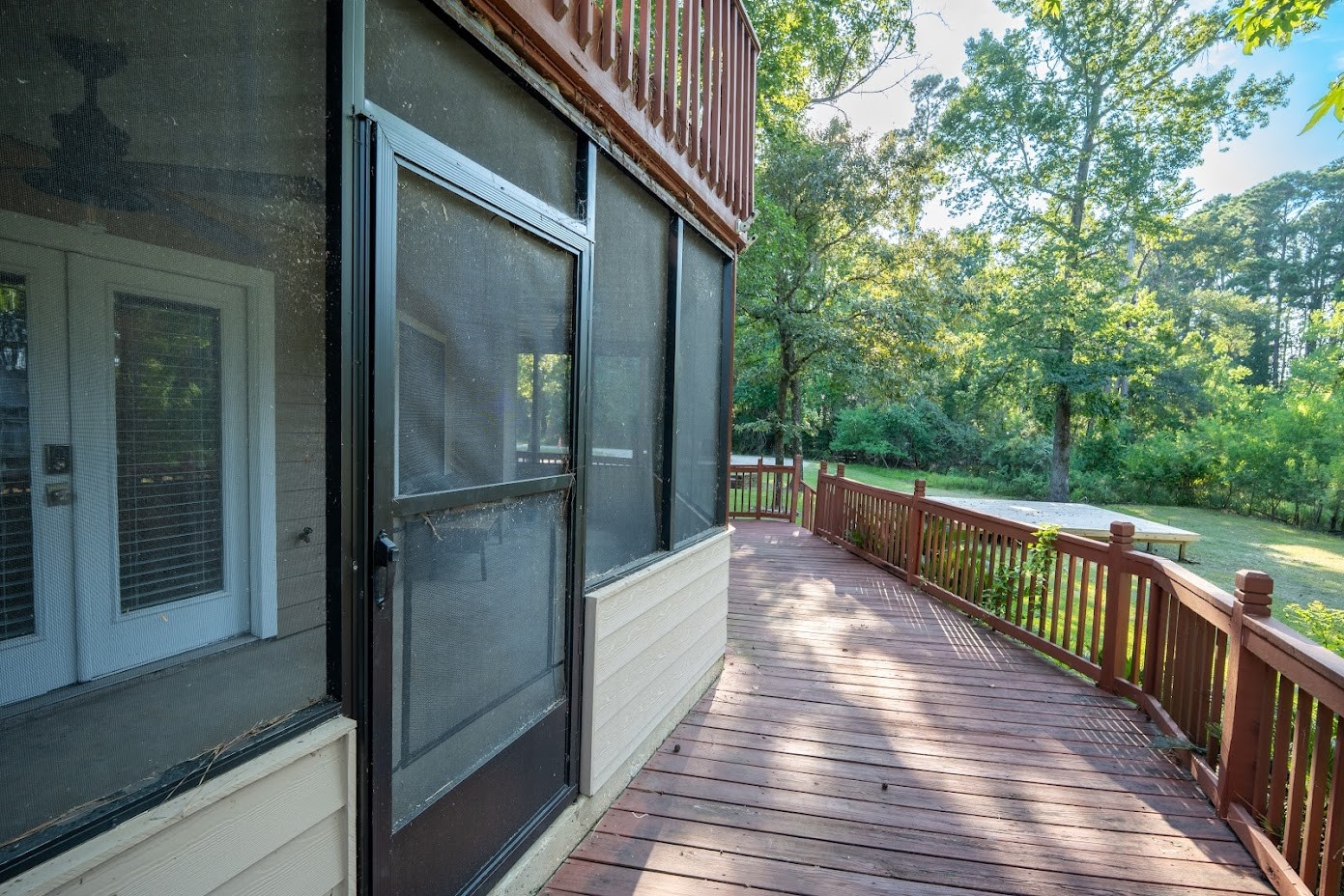 9 Creek Bend Trinity, TX 75862 - Photo 50 of 50 Enjoy your deck with a screen room to keep the bugs off.