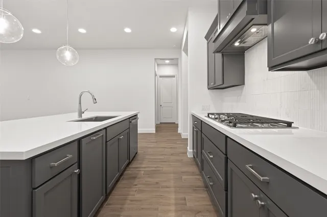 a spacious bathroom with a bathtub and shower