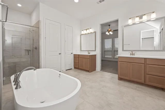 a view of a backyard with sitting area