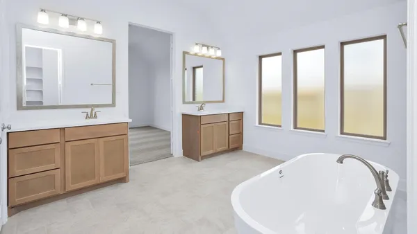 a view of a park with a bench and trees