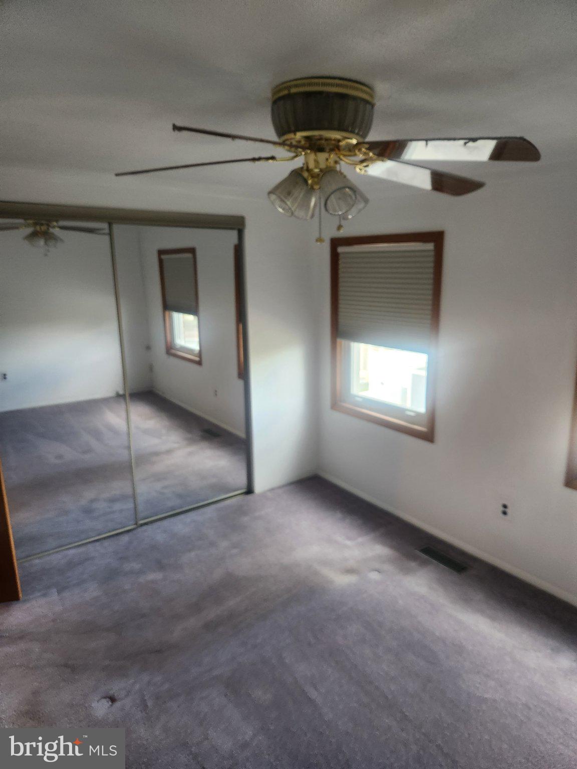 2760 Yarnall Road Baltimore, MD 21227 - Photo 17 of 22 an empty room with a fireplace