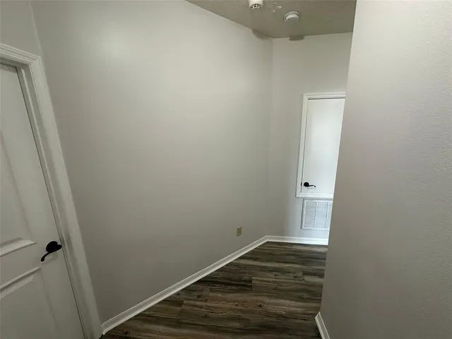 a view of small space with wooden floor