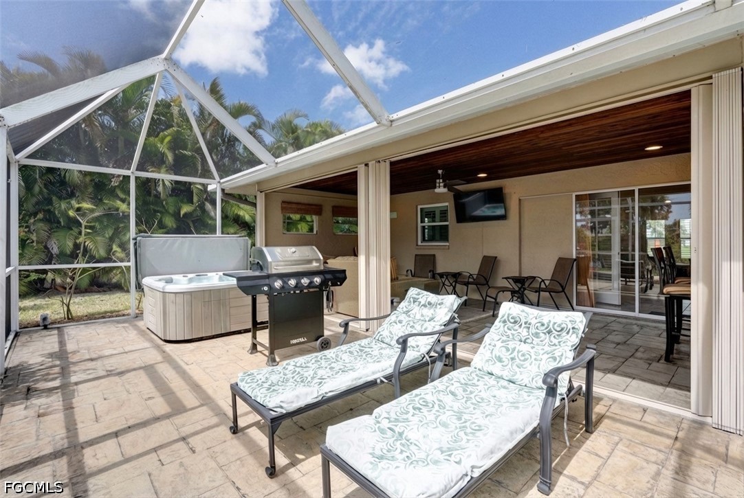 2912 Southwest 1st Terrace Cape Coral, FL 33991 - Photo 23 of 31 a view of outdoor dining space with a table and chairs