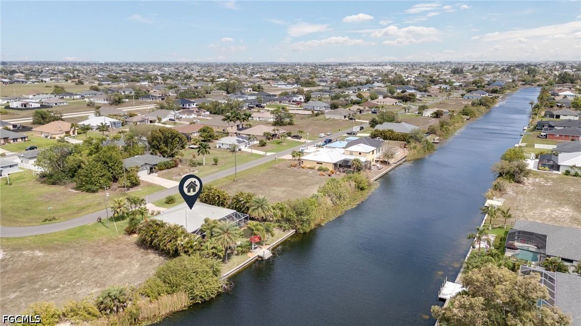2912 Southwest 1st Terrace Cape Coral, FL 33991 - Photo 30 of 31 an aerial view of a house with a yard