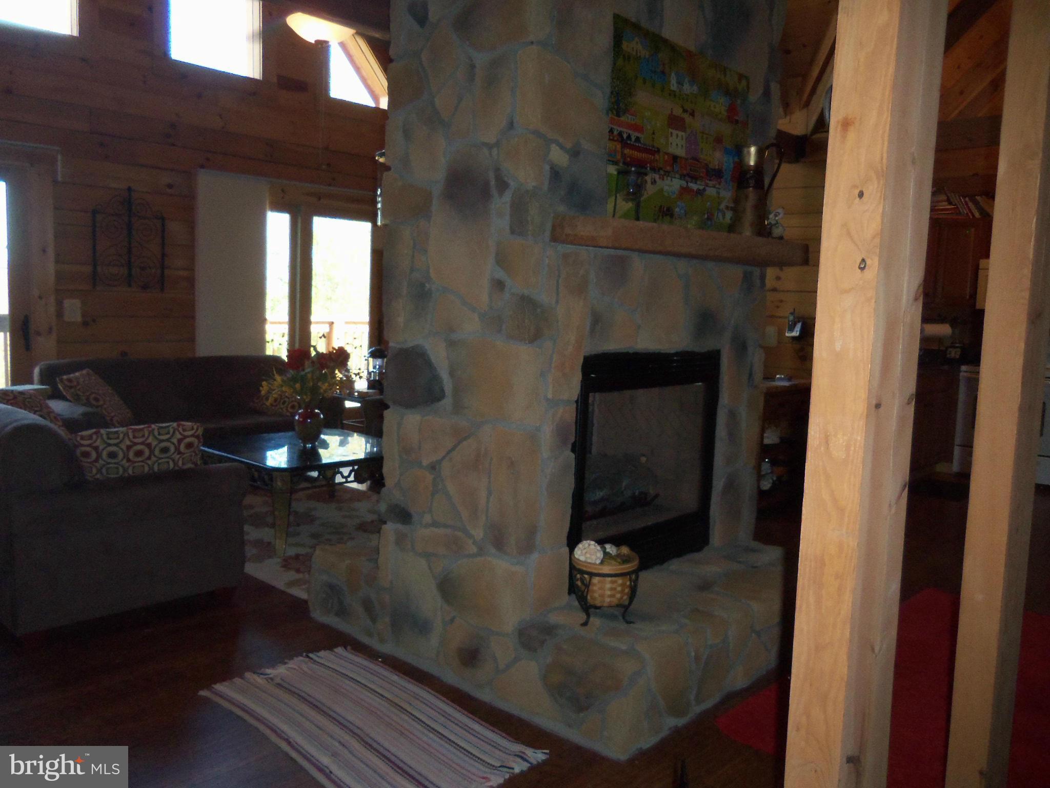 258 Gobbler Road Hedgesville, WV 25427 - Photo 15 of 30 back side of fireplace