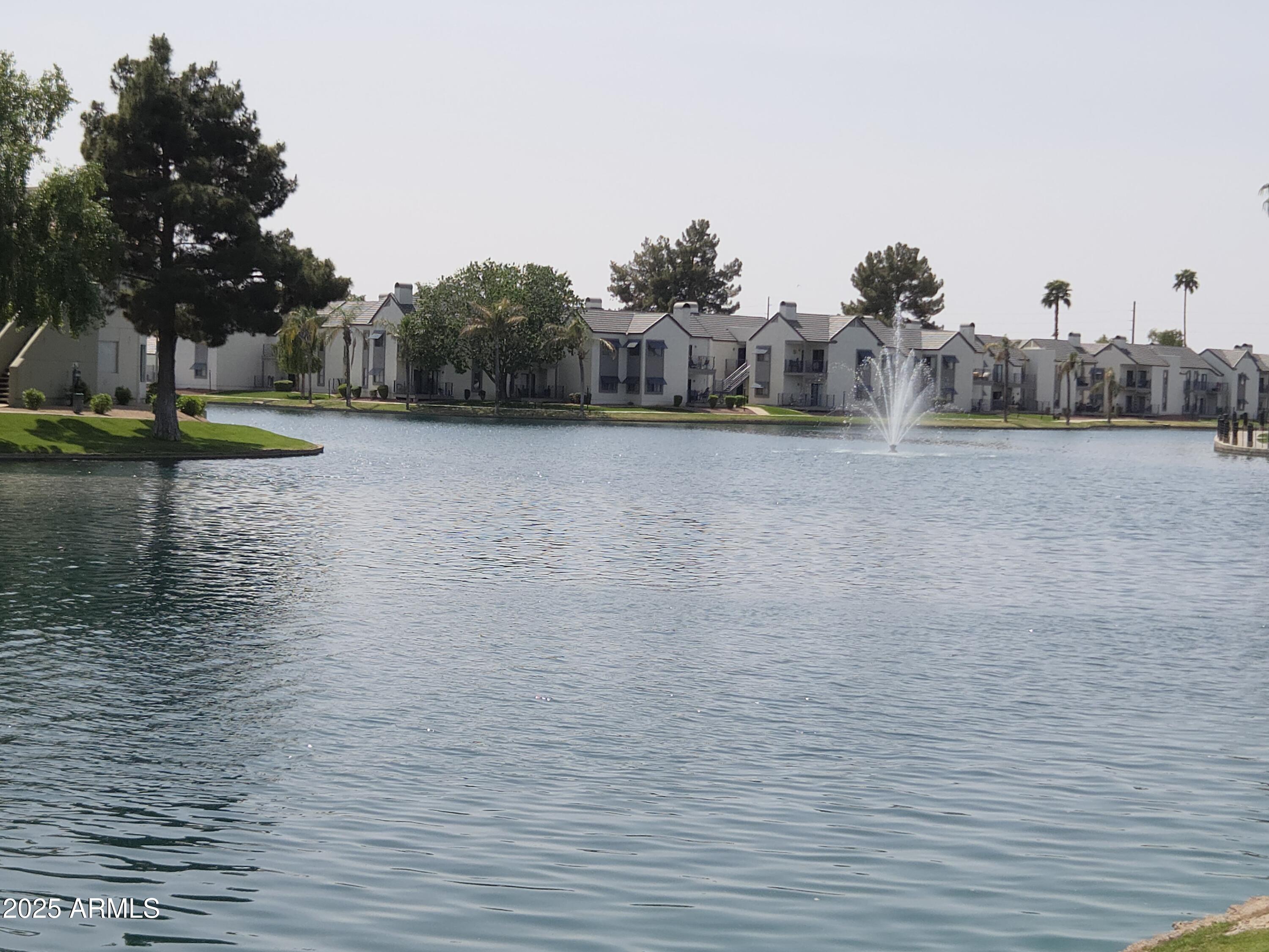 1825 West Ray Road, Unit 2031 Chandler, AZ 85224 - Photo 19 of 21 a view of a lake view