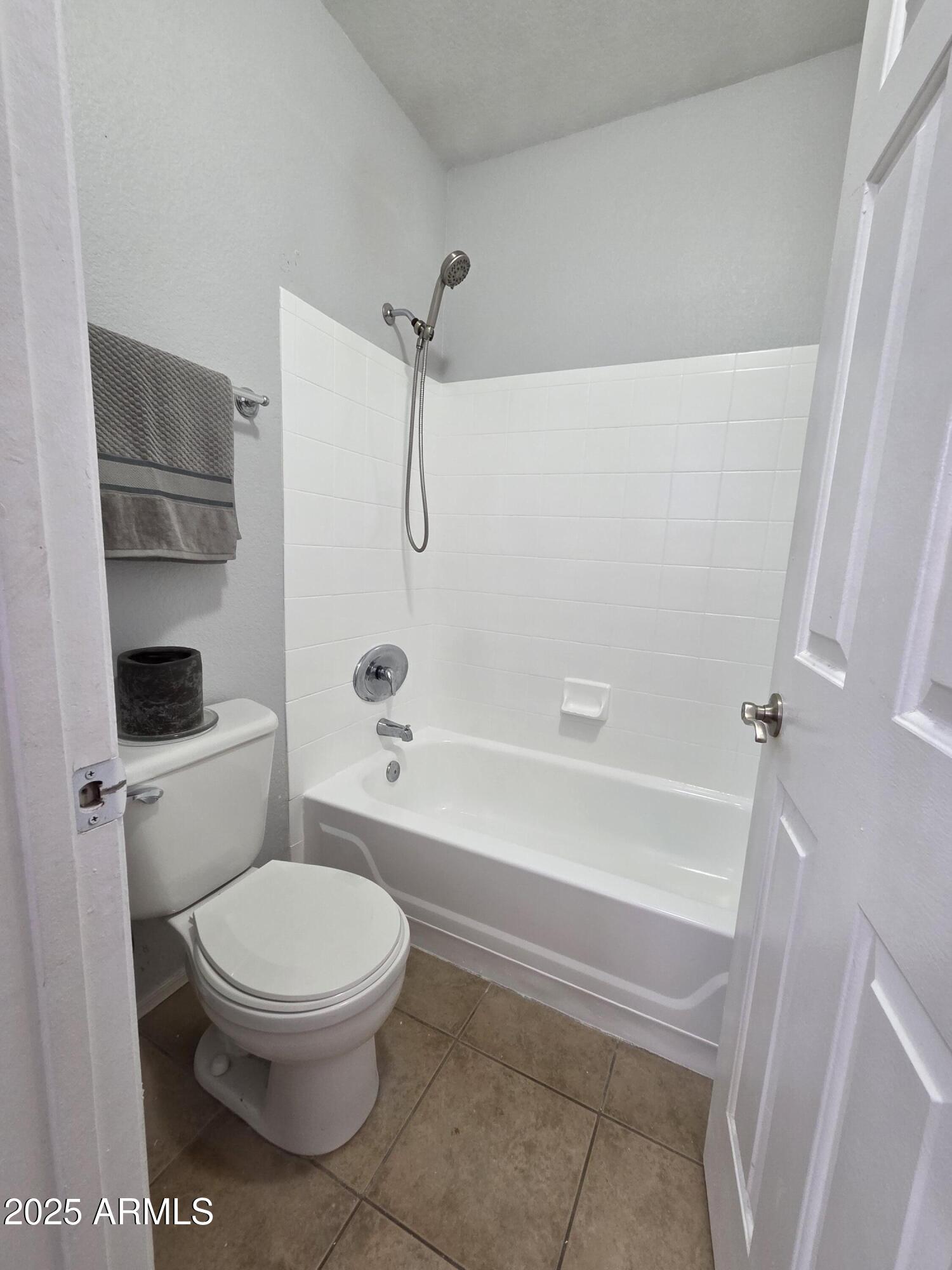 1825 West Ray Road, Unit 2031 Chandler, AZ 85224 - Photo 10 of 21 a bathroom with a toilet and a shower