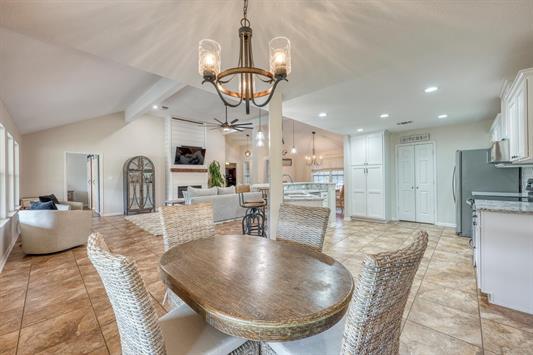 395 Lehne Loop Buchanan Dam, TX 78609 - Photo 16 of 27 a large kitchen with a table and chairs