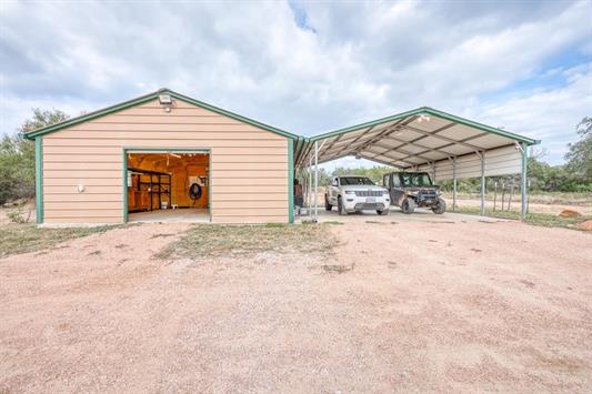 395 Lehne Loop Buchanan Dam, TX 78609 - Photo 8 of 27 a view of a house with a yard