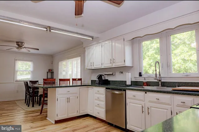 a view of entryway with wooden floor