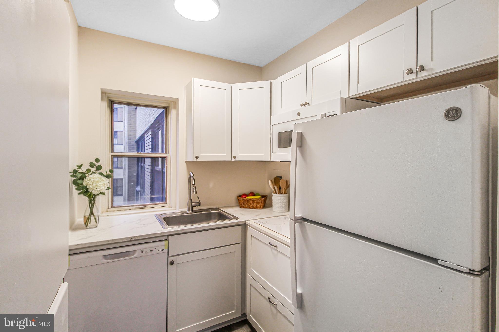 3901 Cathedral Avenue Northwest, Unit 201 Washington, DC 20016 - Photo 12 of 30 Charming kitchen with modern finishes.