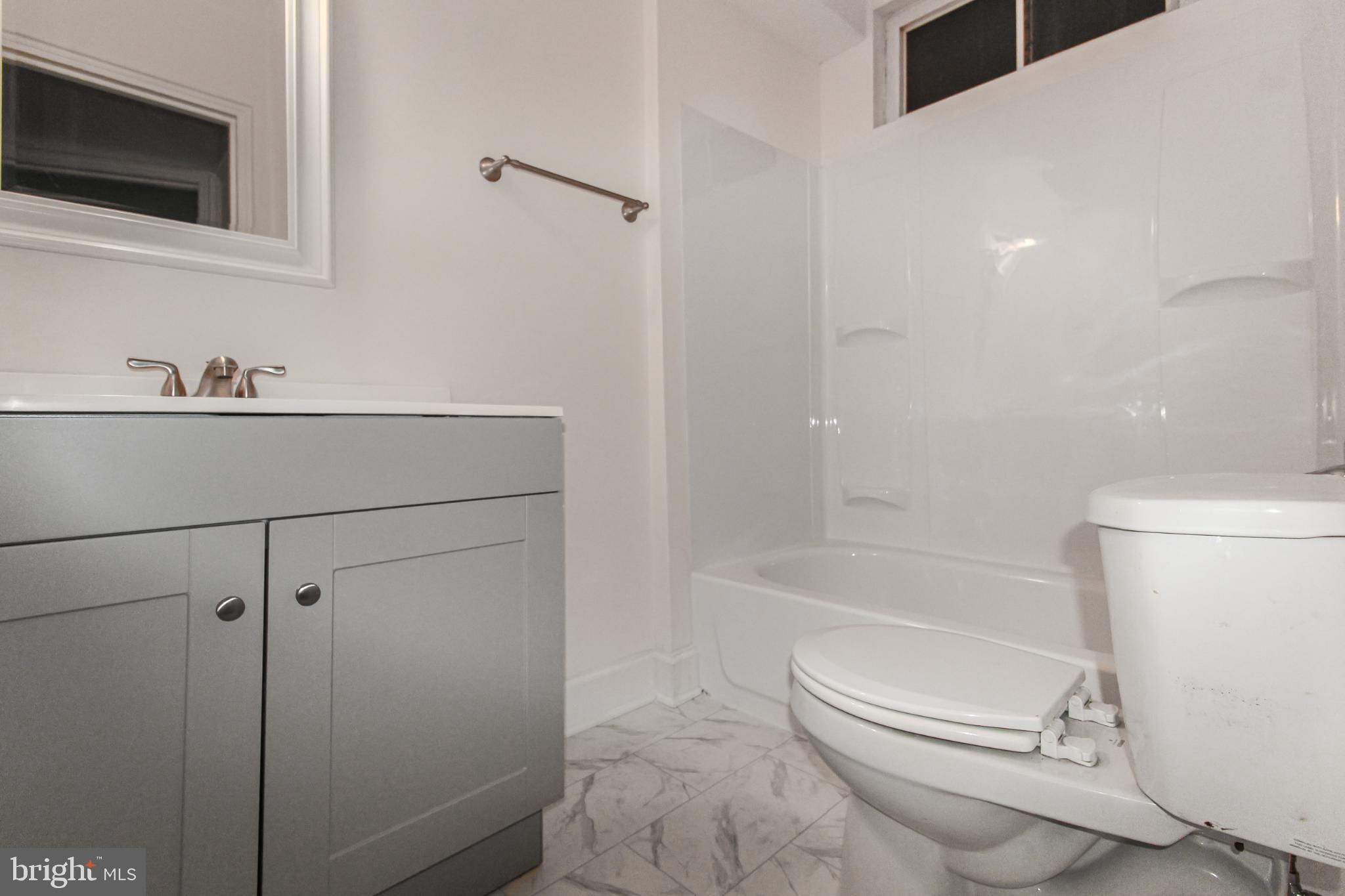 3901 Cathedral Avenue Northwest, Unit 201 Washington, DC 20016 - Photo 18 of 30 Modern bathroom with sleek finishes.