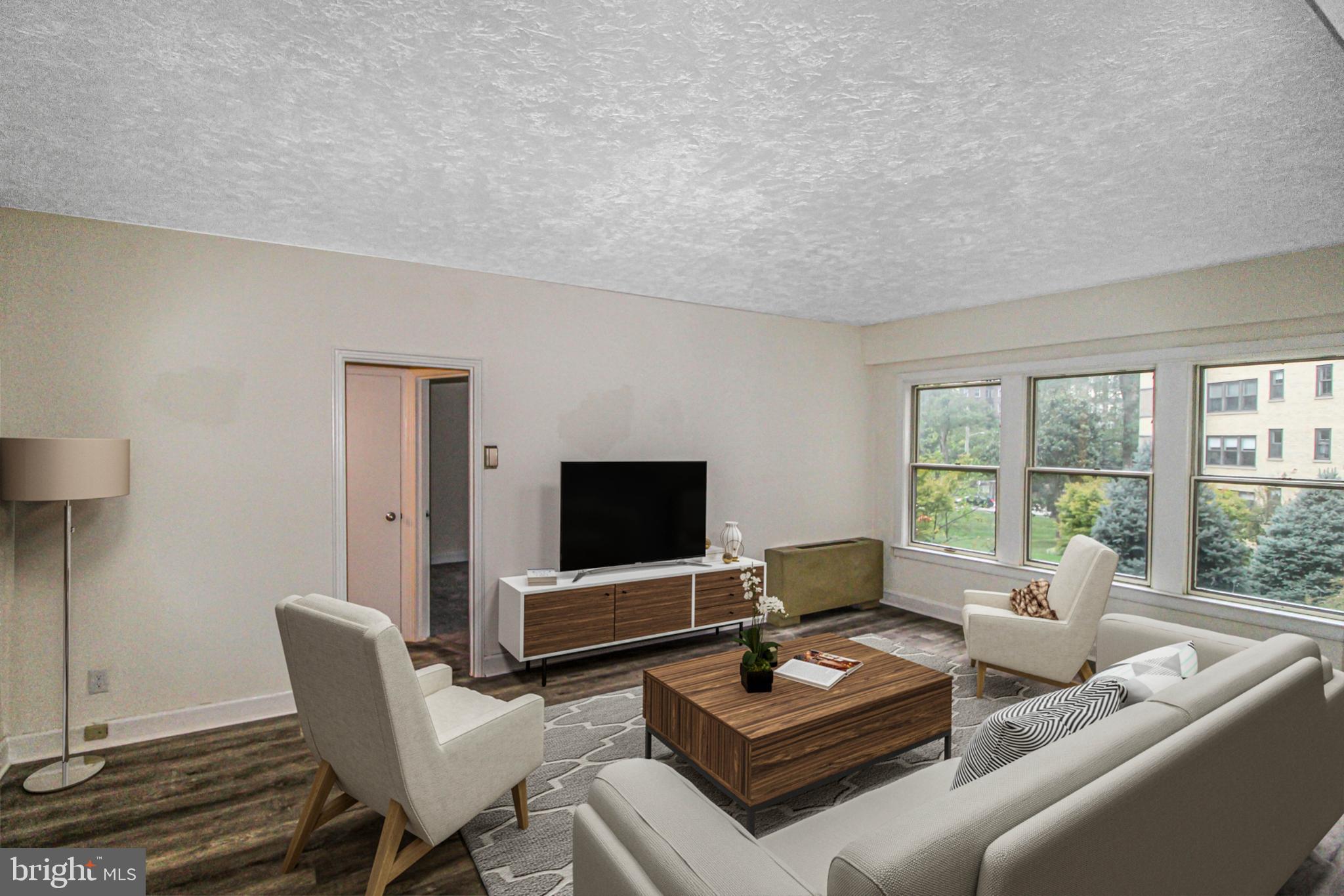 3901 Cathedral Avenue Northwest, Unit 201 Washington, DC 20016 - Photo 2 of 30 Bright and airy living space with modern charm.