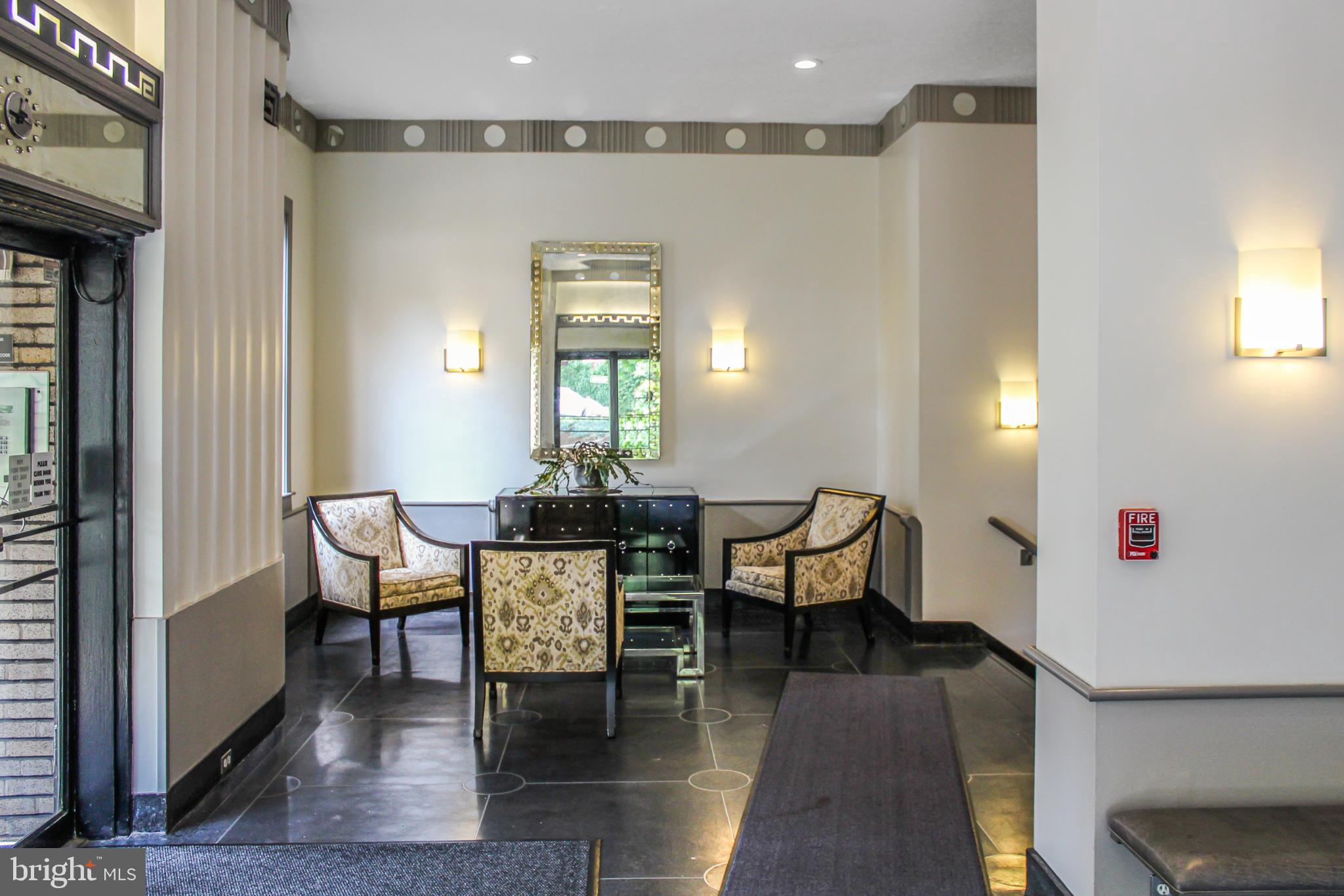 3901 Cathedral Avenue Northwest, Unit 201 Washington, DC 20016 - Photo 24 of 30 Elegant lobby with stylish seating area.