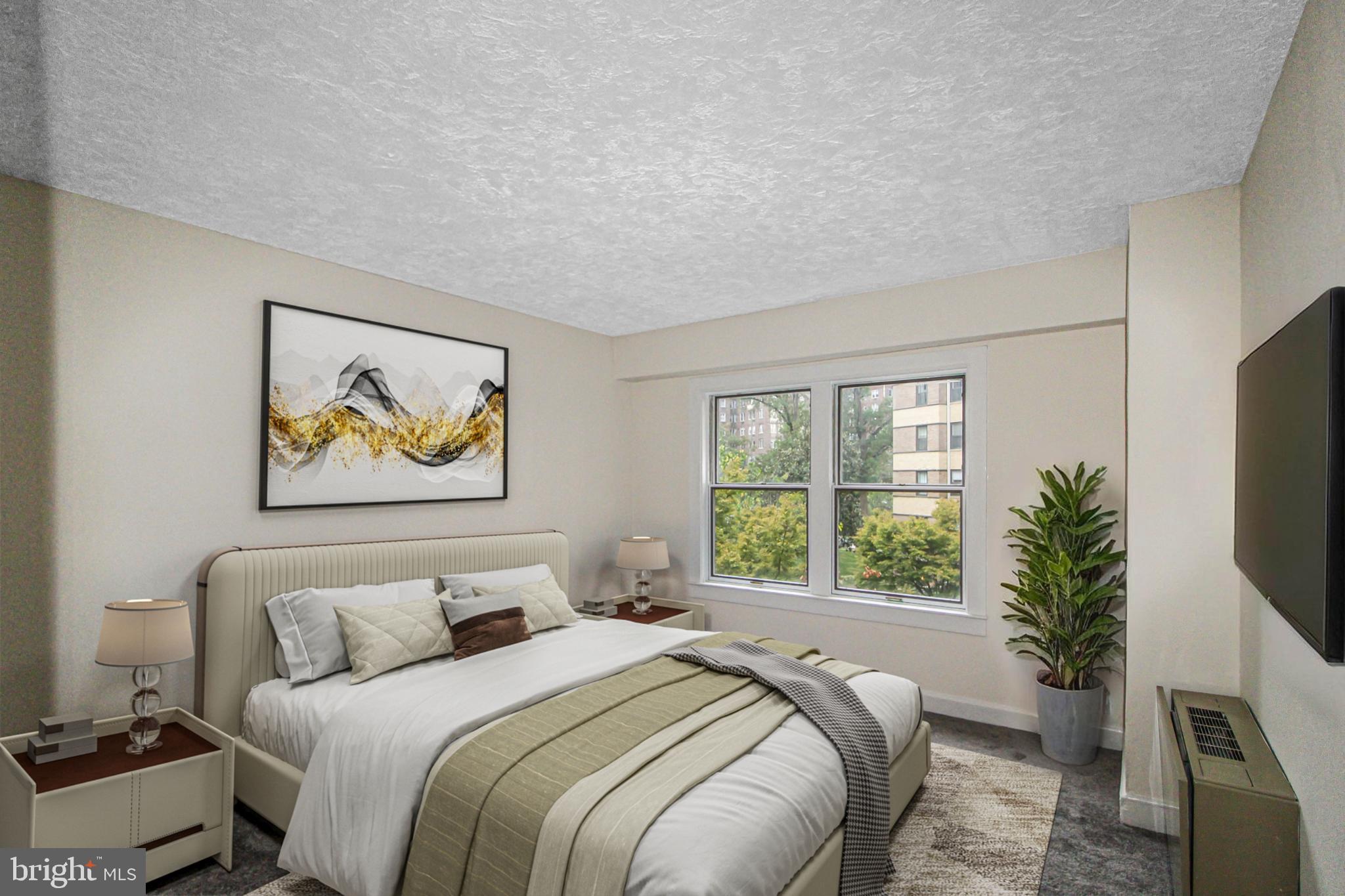 3901 Cathedral Avenue Northwest, Unit 201 Washington, DC 20016 - Photo 6 of 30 Serene bedroom with natural light and style.