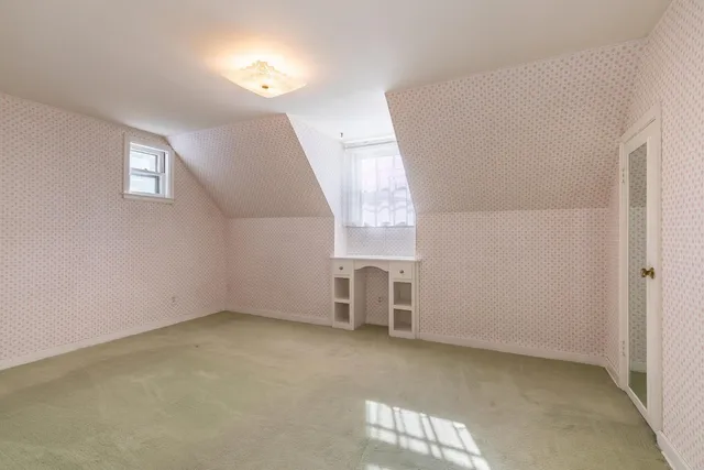 a bathroom with a double vanity sink and mirror