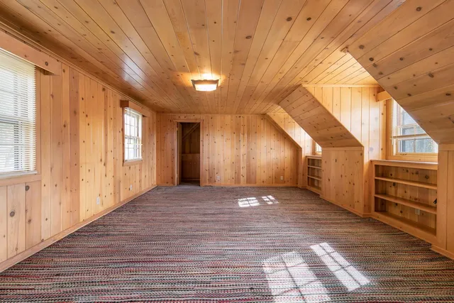 a view of a bathroom from a hallway