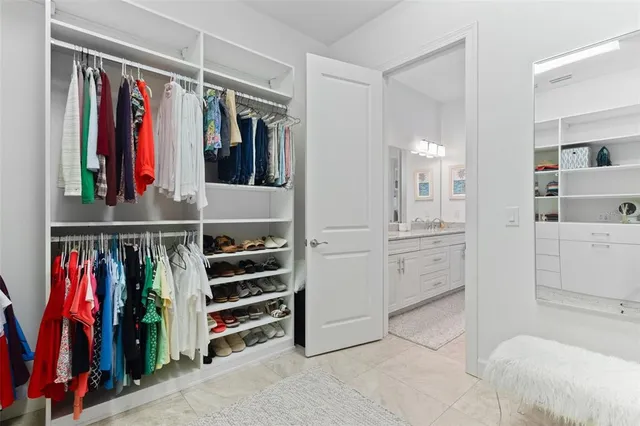 an aerial view of residential houses with outdoor space and street view