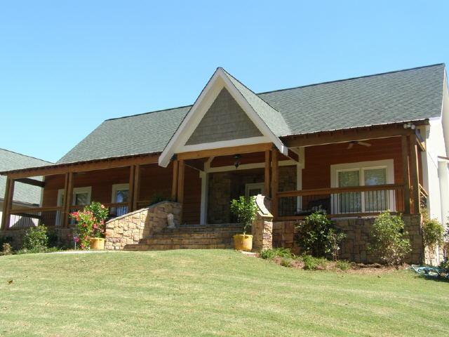 1720 Wayside Road Kingston, GA 30145 - Photo 1 of 1 a front view of a house with garden