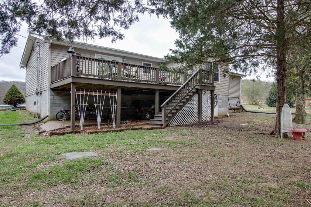 349 Buffalo Road Carthage, TN 37030 - Photo 29 of 30 a view of a house with a backyard and a tree