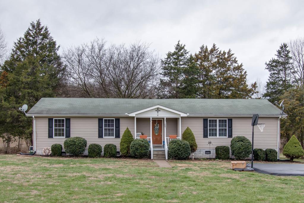 349 Buffalo Road Carthage, TN 37030 - Photo 4 of 30 a front view of a house with a yard
