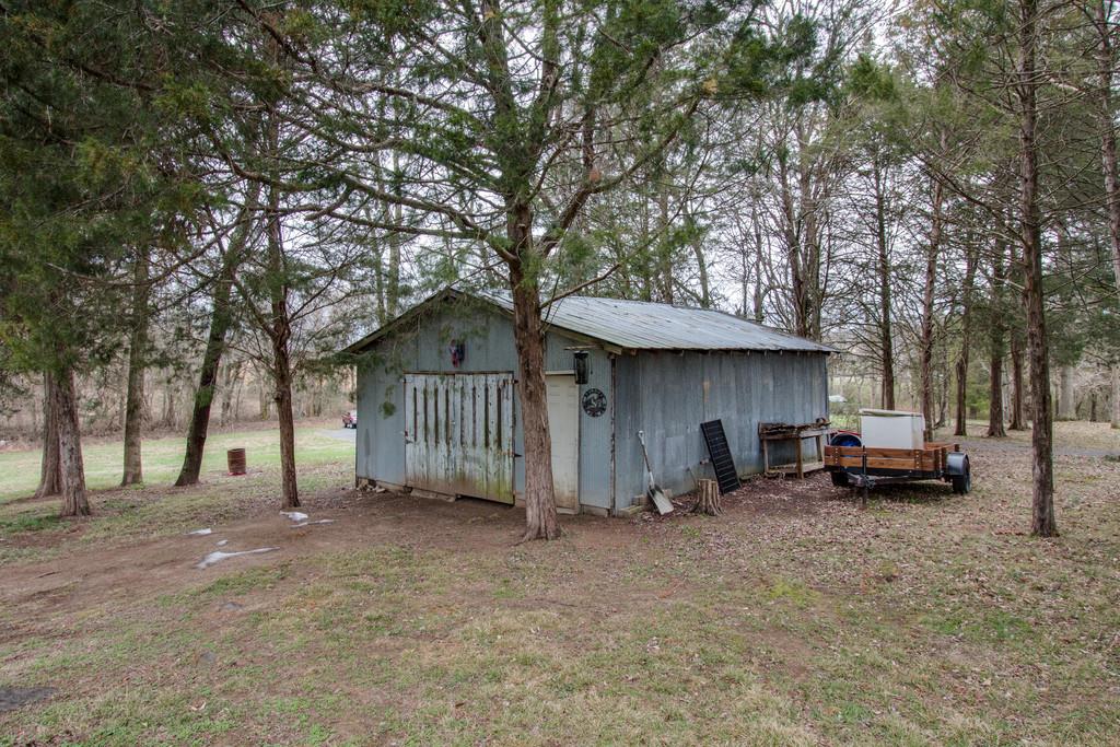 349 Buffalo Road Carthage, TN 37030 - Photo 5 of 30 a view of a house with a yard and wooden fence