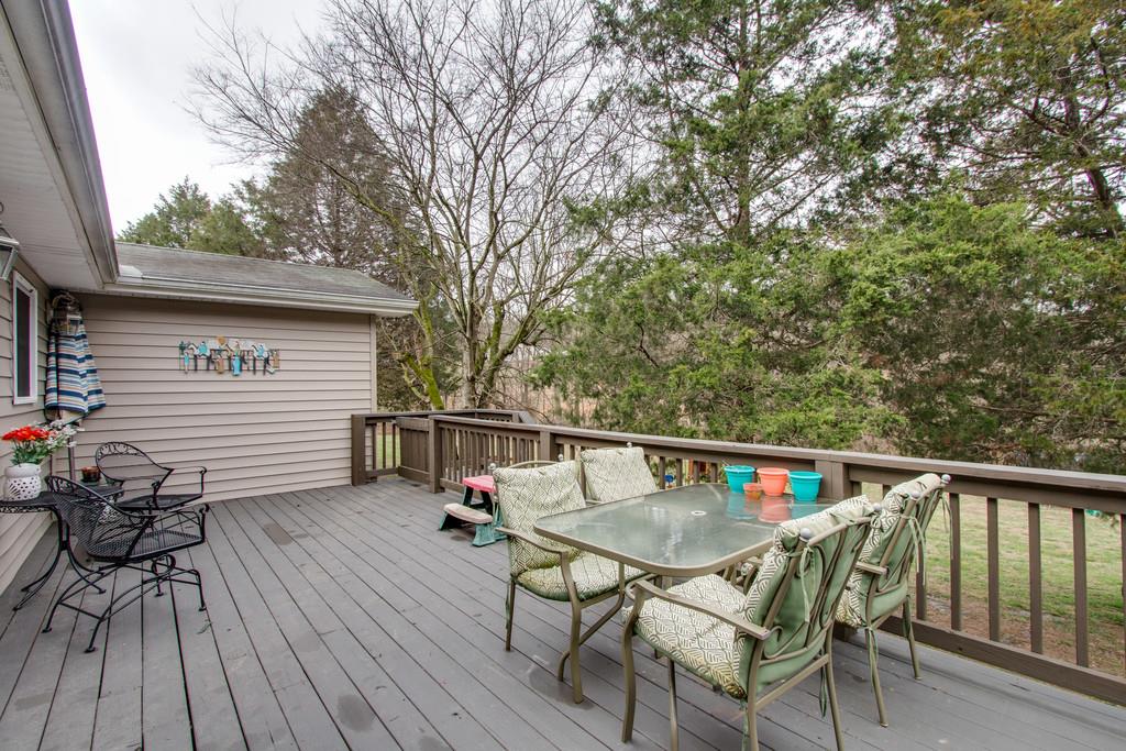 349 Buffalo Road Carthage, TN 37030 - Photo 7 of 30 a balcony with wooden floor table and chairs