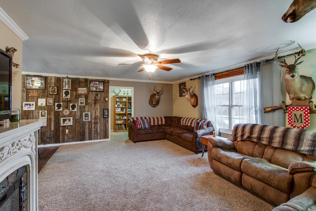 349 Buffalo Road Carthage, TN 37030 - Photo 9 of 30 a living room with furniture and a flat screen tv