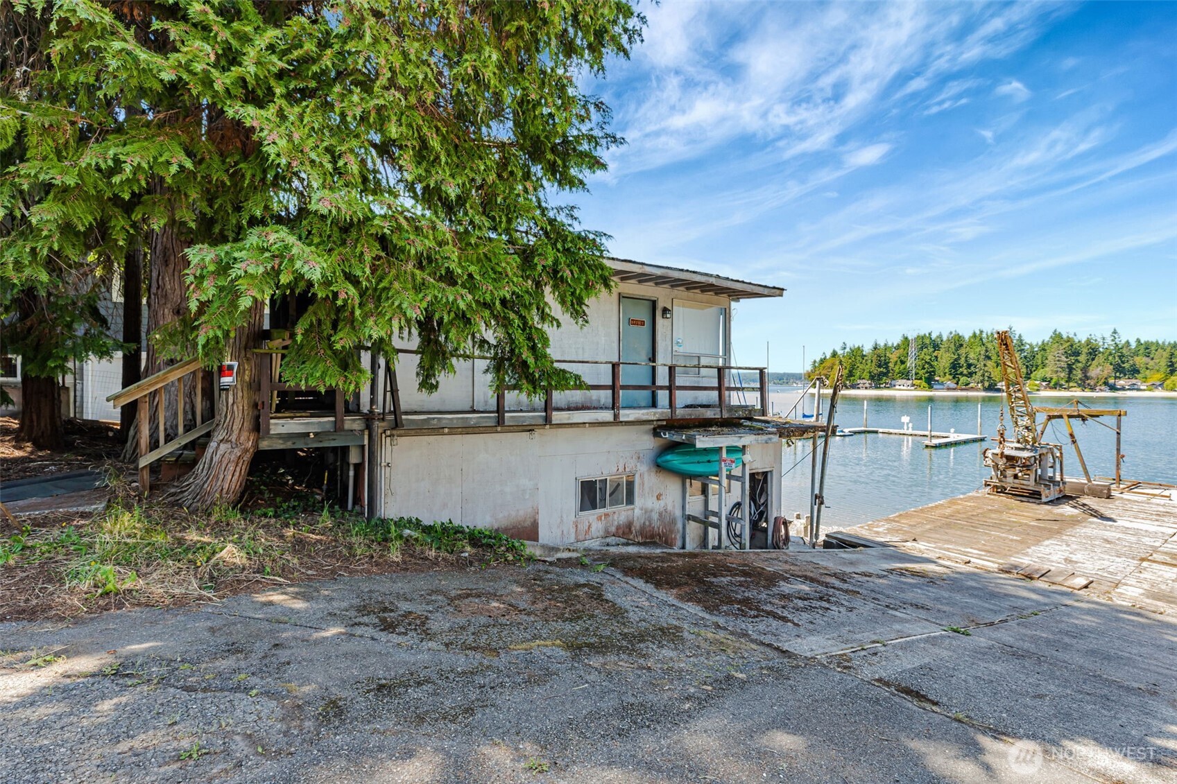 1954 Northeast Grandview Boulevard Keyport, WA 98345 - Photo 15 of 40 a view of a house with backyard porch and sitting area