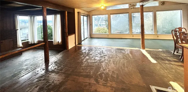 a view of an empty room and window