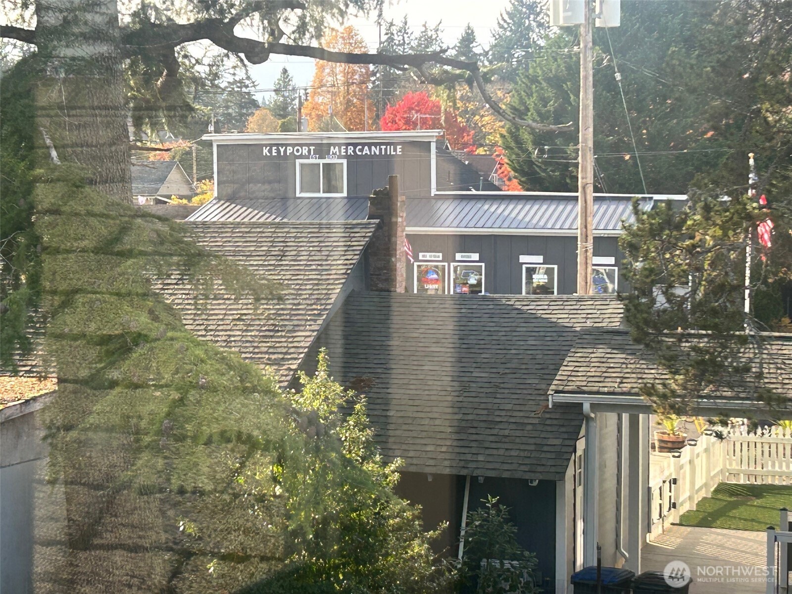 1954 Northeast Grandview Boulevard Keyport, WA 98345 - Photo 24 of 40 a view of a brick house with a large windows