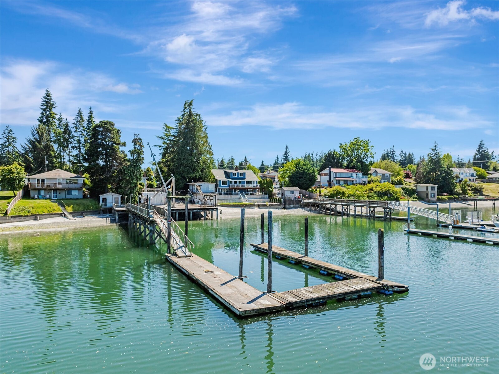 1954 Northeast Grandview Boulevard Keyport, WA 98345 - Photo 28 of 40 a view of a lake with houses