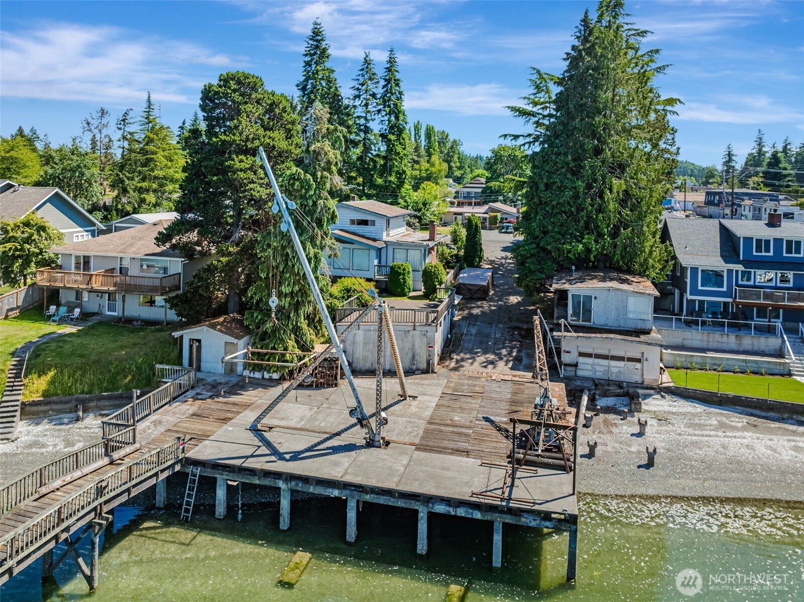 1954 Northeast Grandview Boulevard Keyport, WA 98345 - Photo 32 of 40 an aerial view of a house with swimming pool garden and outdoor seating