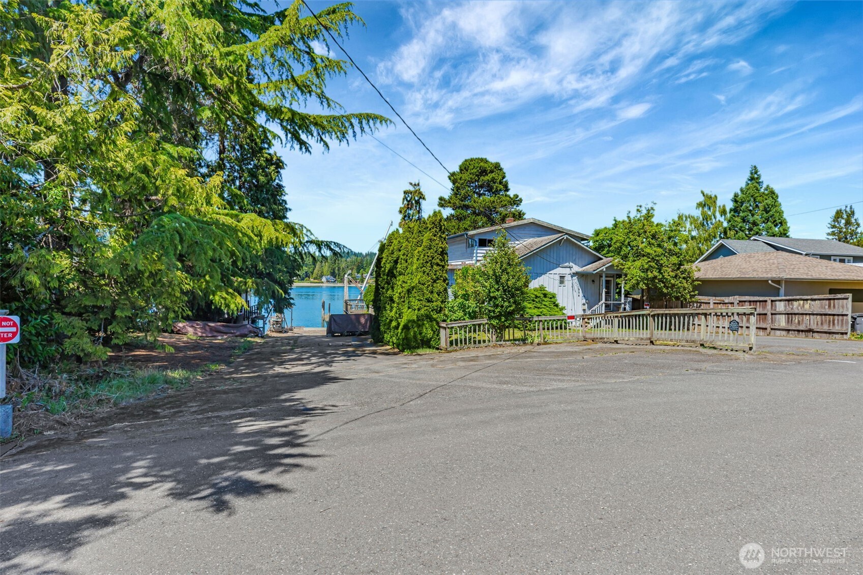 1954 Northeast Grandview Boulevard Keyport, WA 98345 - Photo 4 of 40 a front view of a house with a yard and garage