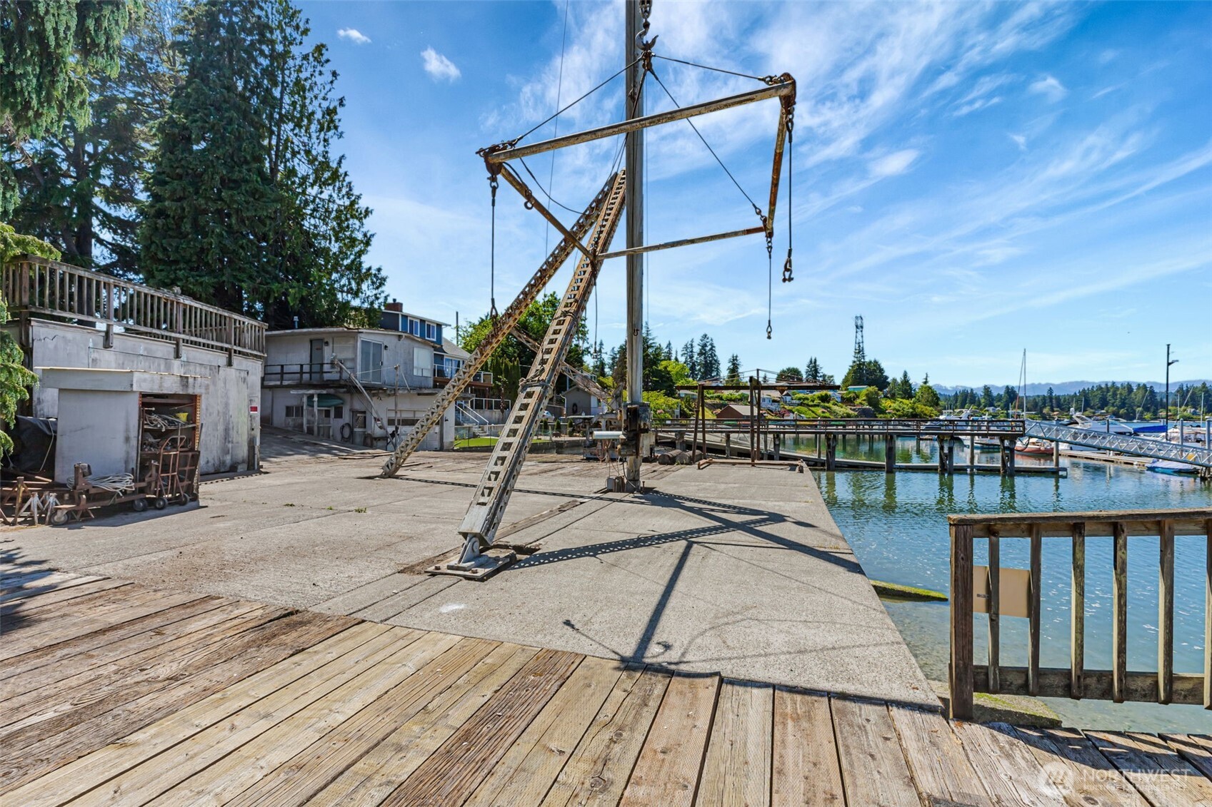 1954 Northeast Grandview Boulevard Keyport, WA 98345 - Photo 9 of 40 a view of a balcony with wooden floor and seating space