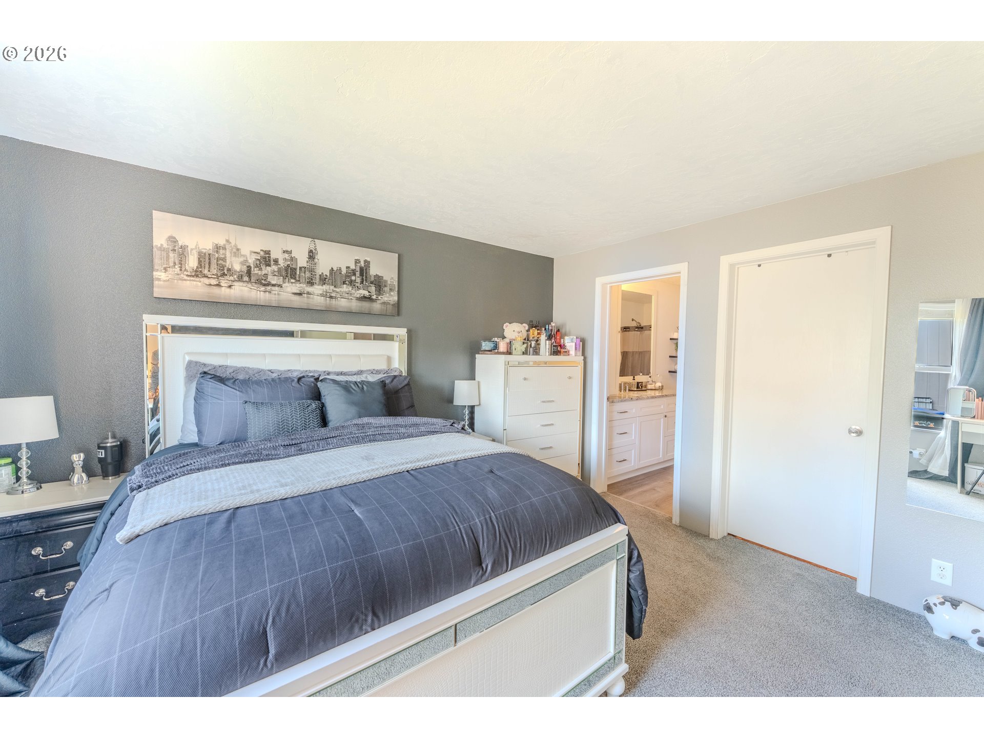 4364 Bren Loop Northeast, Unit 95 Salem, OR 97305 - Photo 24 of 34 a bedroom with a bed and walk in closet