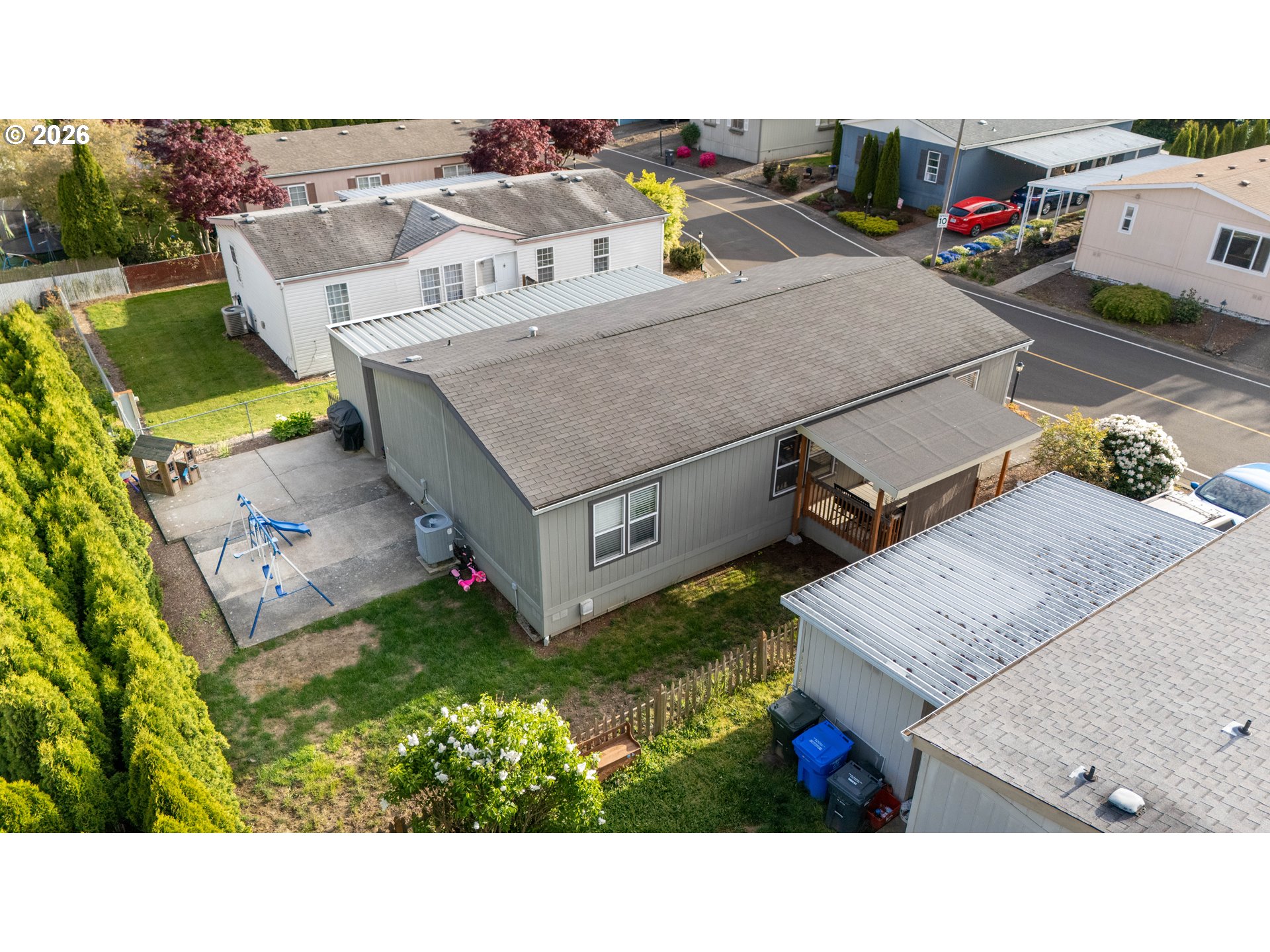 4364 Bren Loop Northeast, Unit 95 Salem, OR 97305 - Photo 32 of 34 a view of a house with a patio