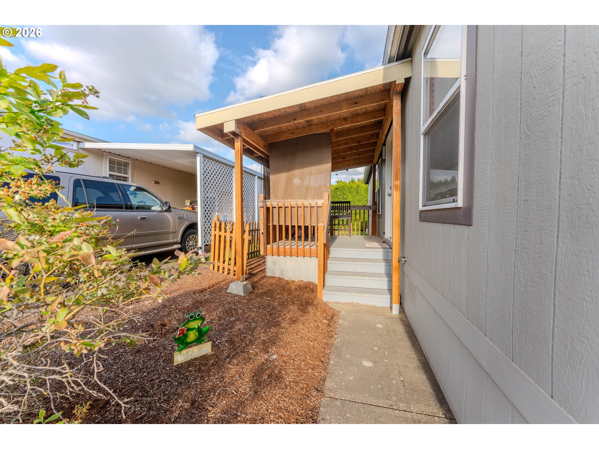 4364 Bren Loop Northeast, Unit 95 Salem, OR 97305 - Photo 5 of 34 a backyard of a house with seating space
