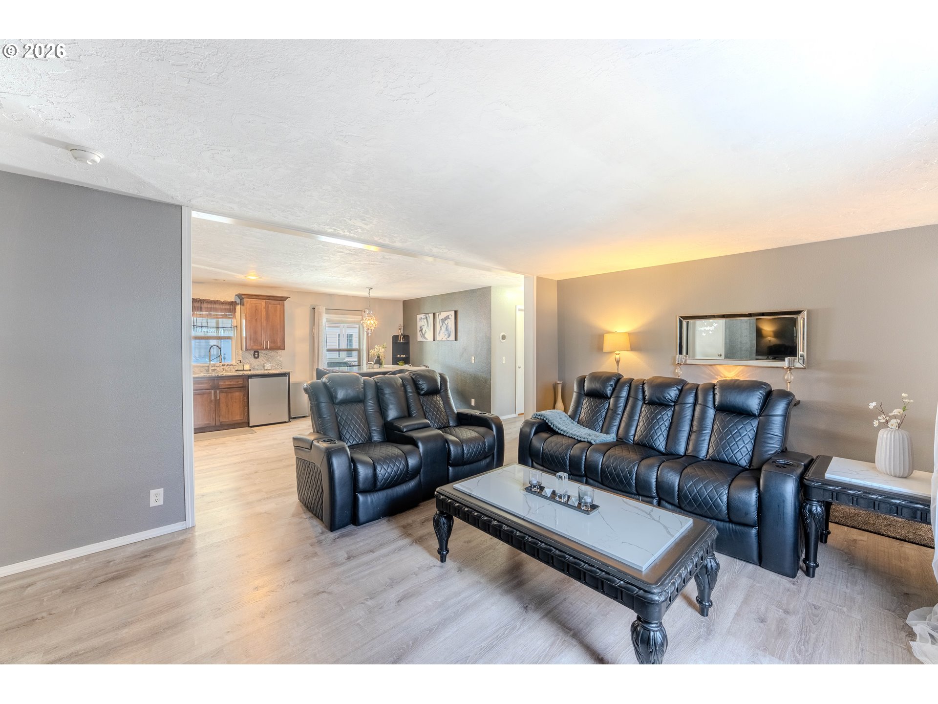 4364 Bren Loop Northeast, Unit 95 Salem, OR 97305 - Photo 9 of 34 a living room with furniture and a wooden floor