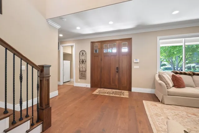 a living room with furniture and a rug