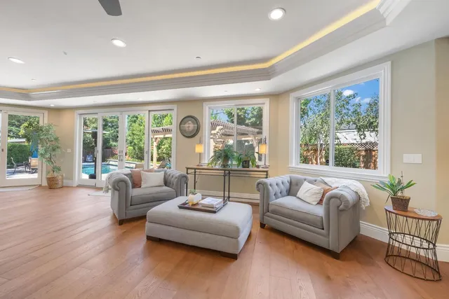 a spacious bedroom with a bed and a window