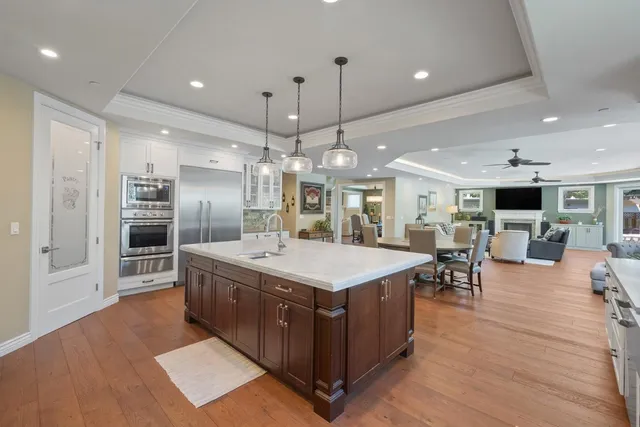 a view of a patio with a table and chairs