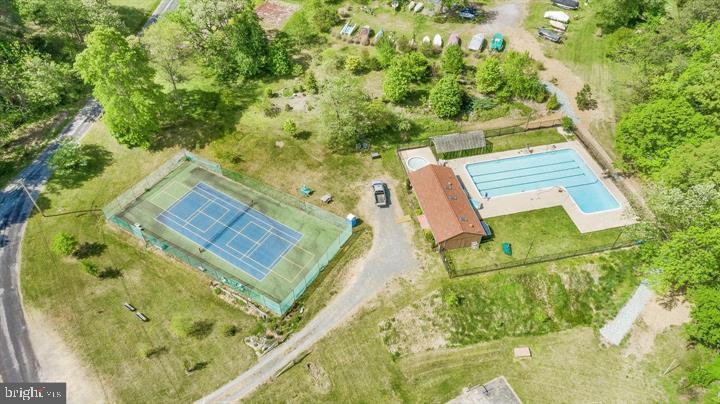 2836 Allspice Road Port Republic, MD 20676 - Photo 12 of 14 Tennis-pickleball court 1 of 2, outdoor pool