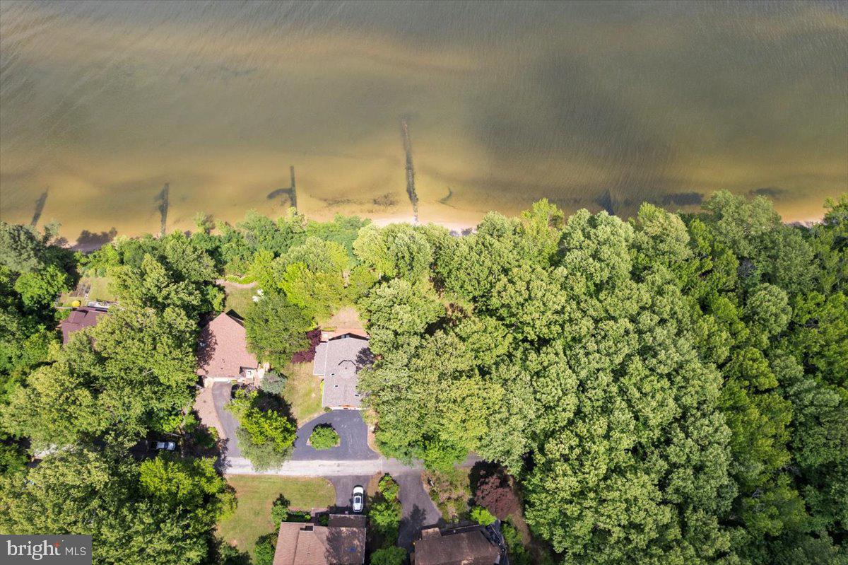 2836 Allspice Road Port Republic, MD 20676 - Photo 4 of 14 Lot to R of 2828, shoreline rock work highlighted.